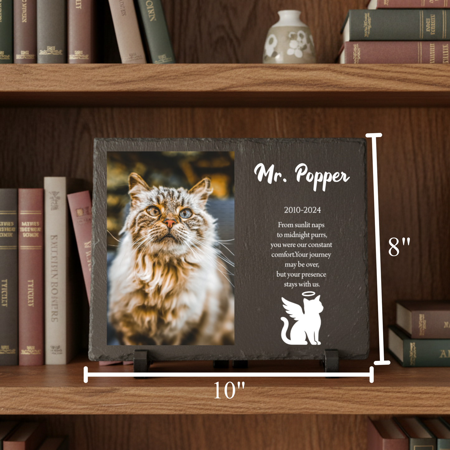 Slate pet memorial plaque on a wooden shelf with a cat photo, the name Mr. Popper, dates and a personal tribute message beside an angel cat silhouette
