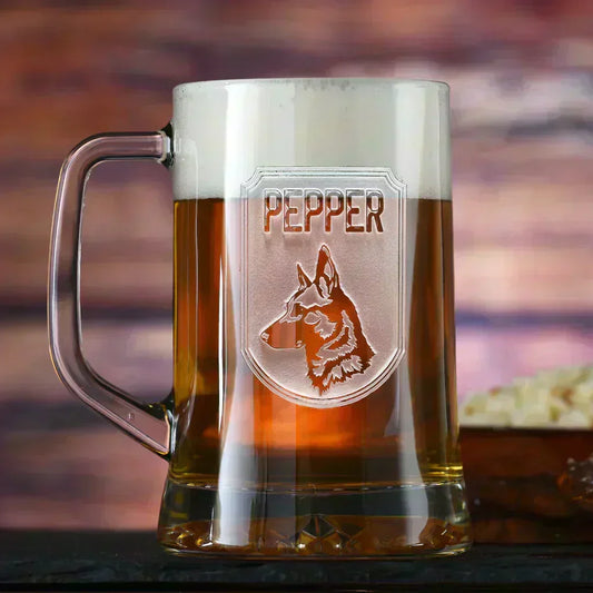 Engraved glass beer mug personalized with the name Pepper and a German Shepherd portrait, filled with beer on a rustic wooden bar