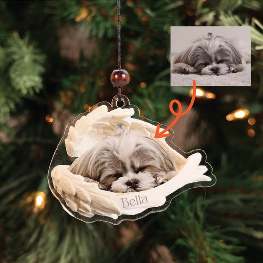 A personalized angel wing pet ornament, a keepsake that carries the spirit of the rainbow bridge for a pet who has passed.