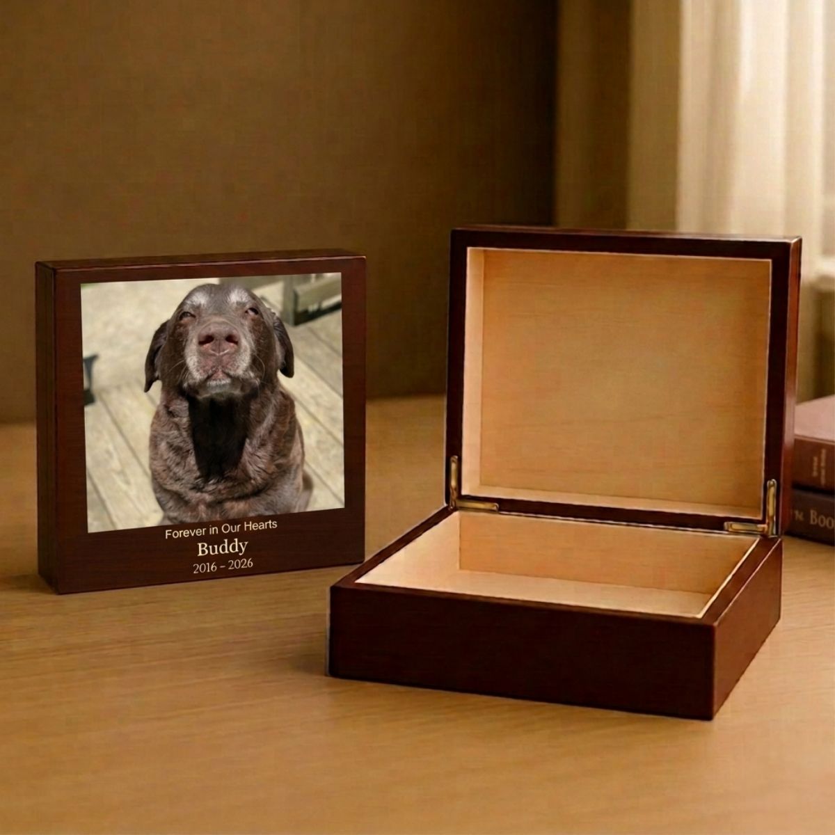 Personalized pet memorial keepsake box shown open, with a cedar lined interior for a collar, tags and photos, beside a second box printed with a chocolate Labrador's photo and name