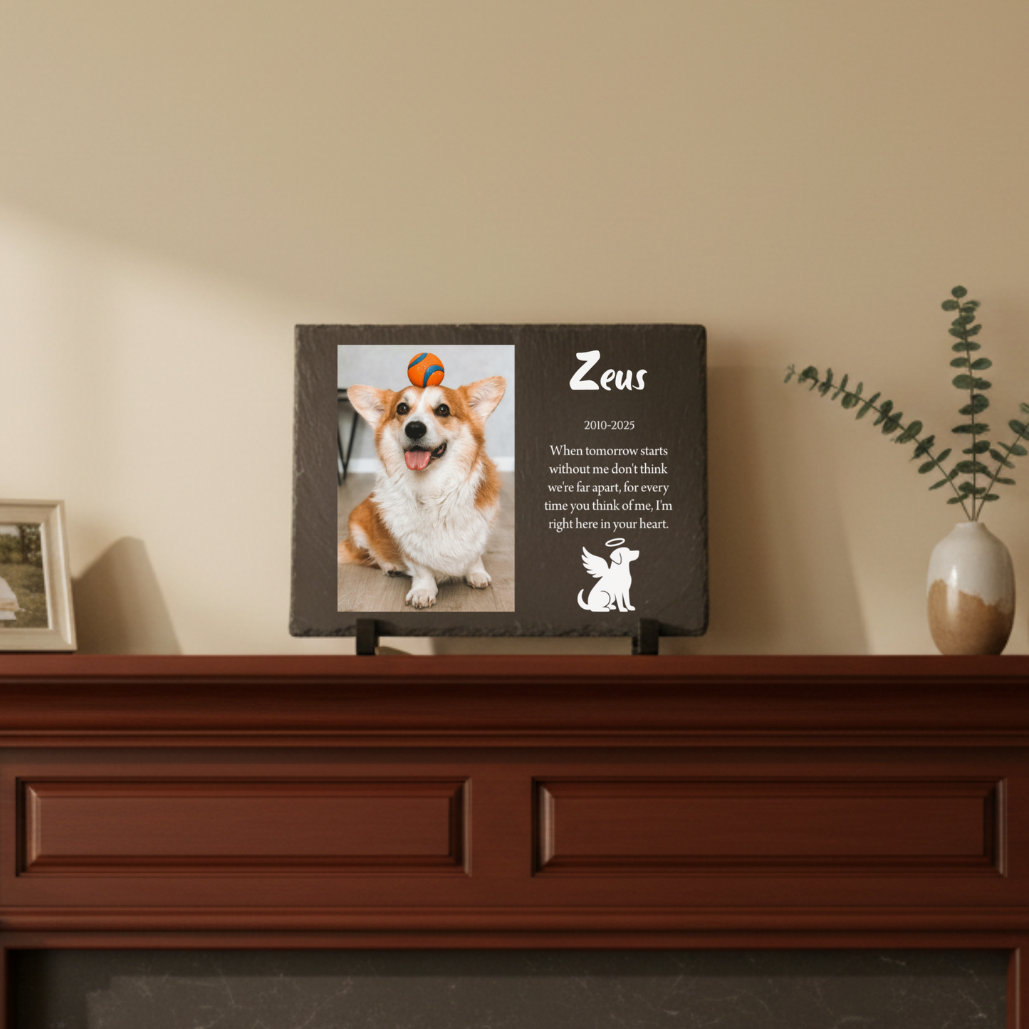 Slate memorial plaque on a mantel, printed with a dog's photo, the name Zeus, the dates 2010 to 2025 and a custom message with an angel dog icon