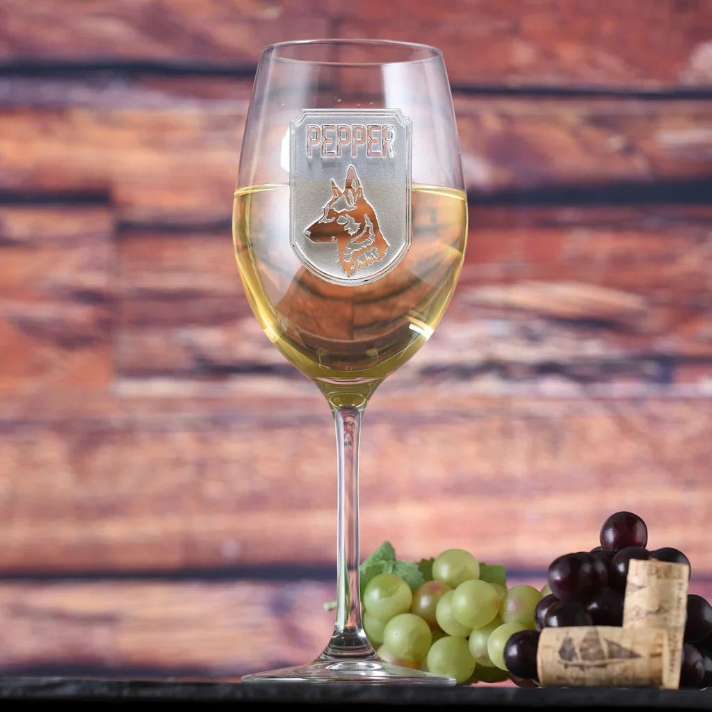 Personalized wine glass featuring a deeply carved dog breed image and pet's name.