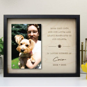 Personalized wooden memorial plaque with engraved pet portrait and inscription.