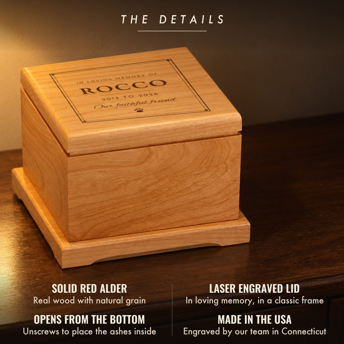 Details of the remembrance pet urn: solid red alder, In Loving Memory Of Rocco, 2013 to 2026 engraved in a classic frame, opens from the bottom, made in the USA
